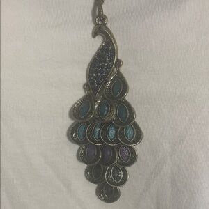 Elegant Peacock Pendant Necklace individually knotted a brushed antique gold